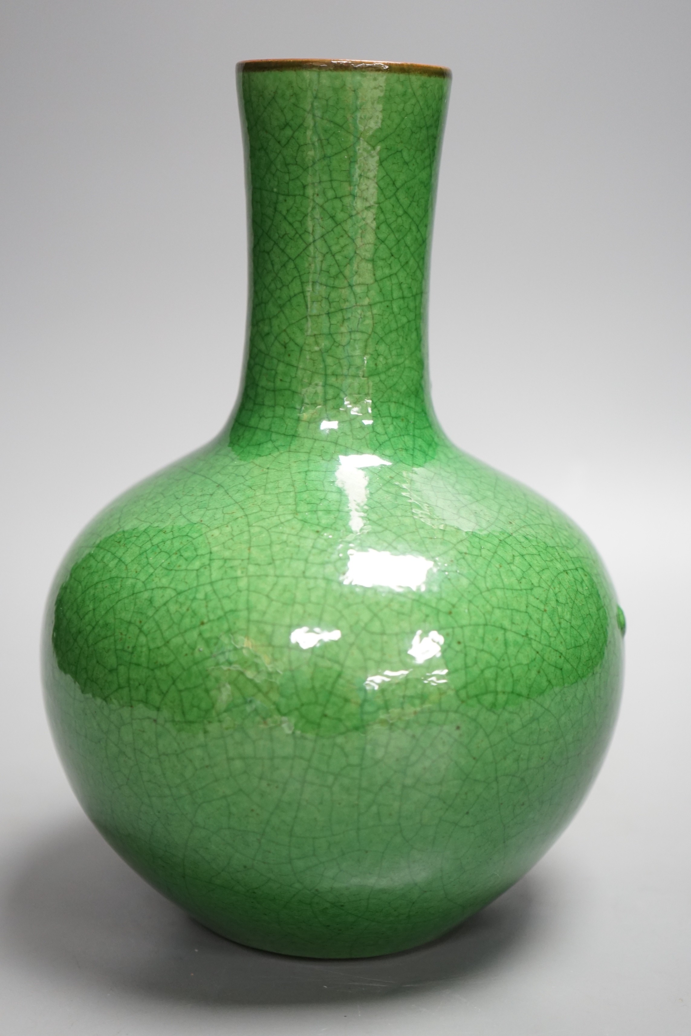 A Chinese green crackleglaze bottle vase, 24cm